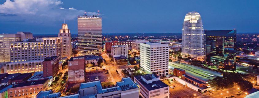 An arial view of the Winston-Salem skyline in the evening.